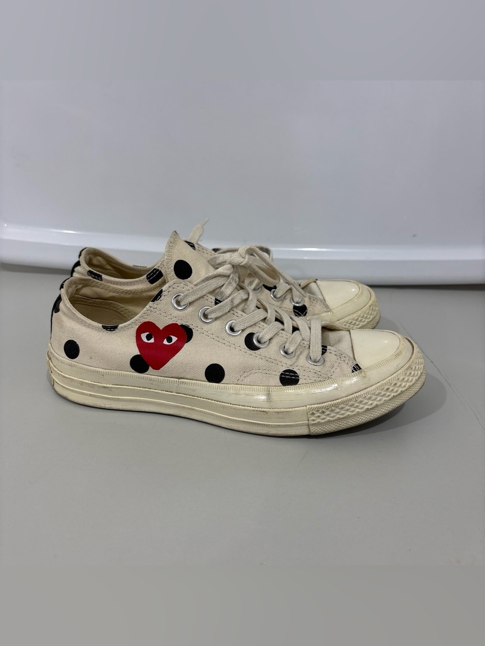 Comme des Garçons PLAY Polka Dot Low-Top Sneakers in Cream, Black & Red